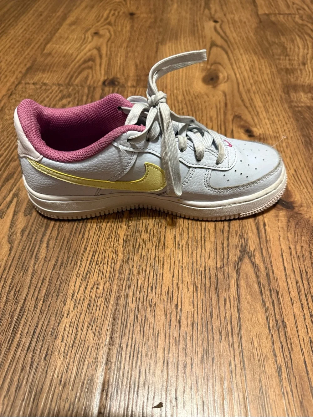 Nike Kids White Sneakers with Yellow Swoosh and Pink Lining